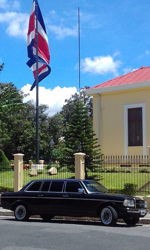 COSTA RICA NATIONAL FLAG WITH A MERCEDES W123 SEDAN LIMOUSINE
